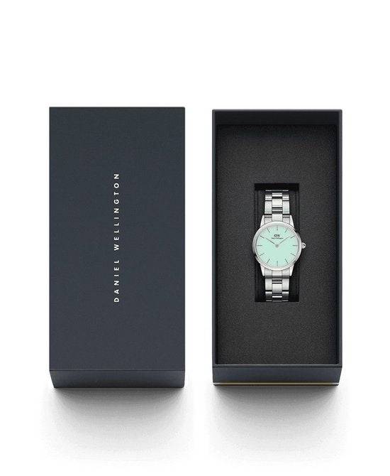 Daniel Wellington Iconic Link Capri 32mm horloge voor dames met zilveren schakelband en mintgroene wijzerplaat. Elegant en tijdloos ontwerp.