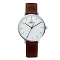 Obaku Denmark Dameshorloge 37mm met witte wijzerplaat en bruin leren bandje, minimalistisch design voor dames. Elegant horloge in Scandinavische stijl.