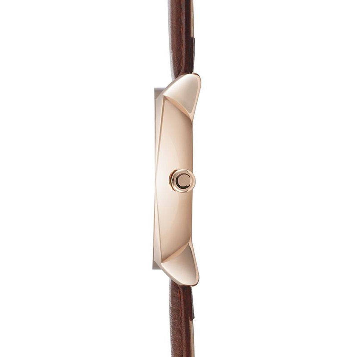Zijaanzicht van Obaku Denmark herenhorloge V193GM 44mm met slanke roségouden kast en bruine leren band. Elegant design voor moderne heren.
