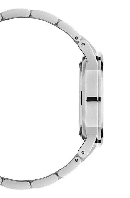 Zijaanzicht van de Daniel Wellington Iconic Link Capri 32mm dames horloge met zilverkleurige schakelband en slanke kast. Elegant en tijdloos design.