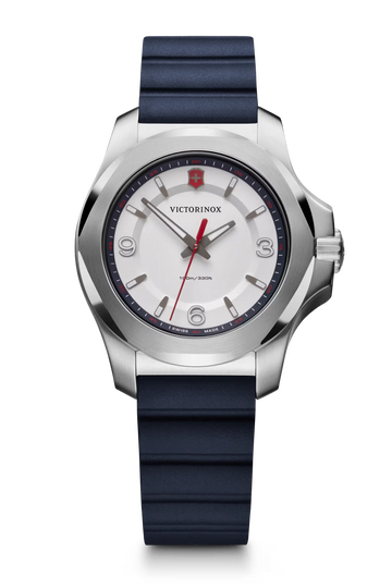 Victorinox dameshorloge voor slanke pols met 37mm roestvrijstalen kast, witte wijzerplaat en blauwe rubberen band. Swiss Made, waterdicht tot 10ATM.